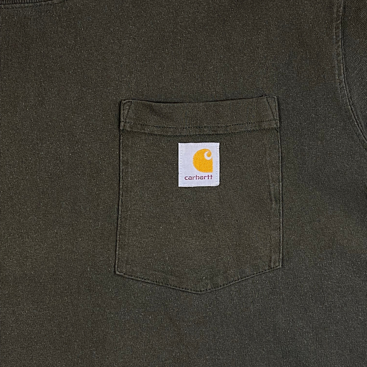 Digg It Thrift & Vintage faded army green heavyweight cotton pocket t-shirt with Carhartt logo patch