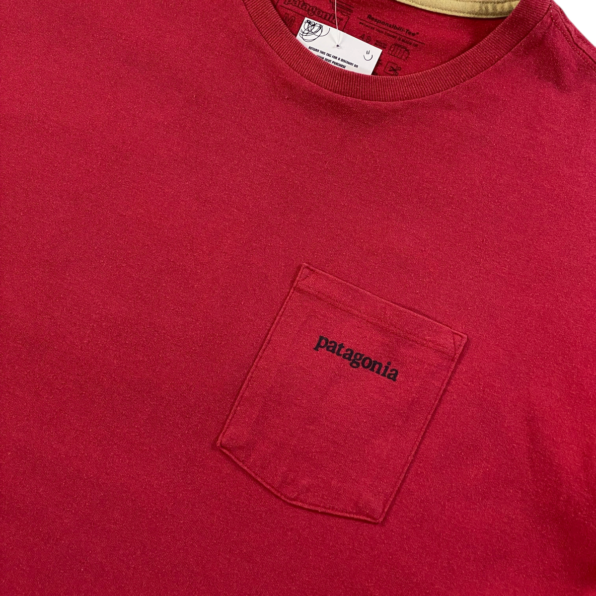 Digg It Thrift & Vintage brick red Patagonia pocket t-shirt with mountain ridge logo, size medium, cotton fabric