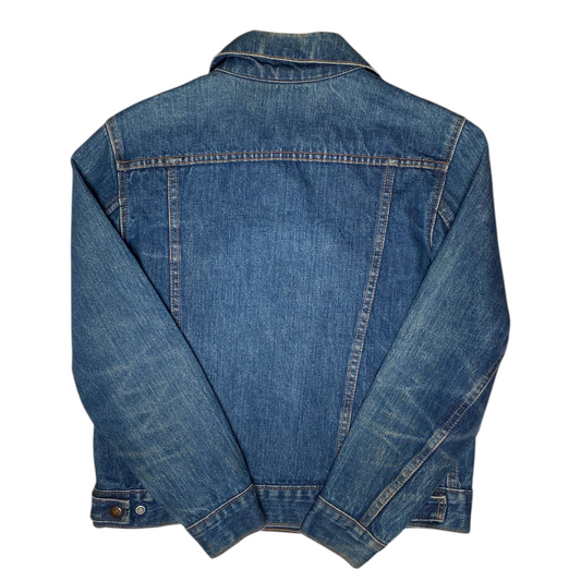 Back view of a vintage Digg It Thrift & Vintage 1970s Levi's for Gals blue denim trucker jacket with faded wash.
