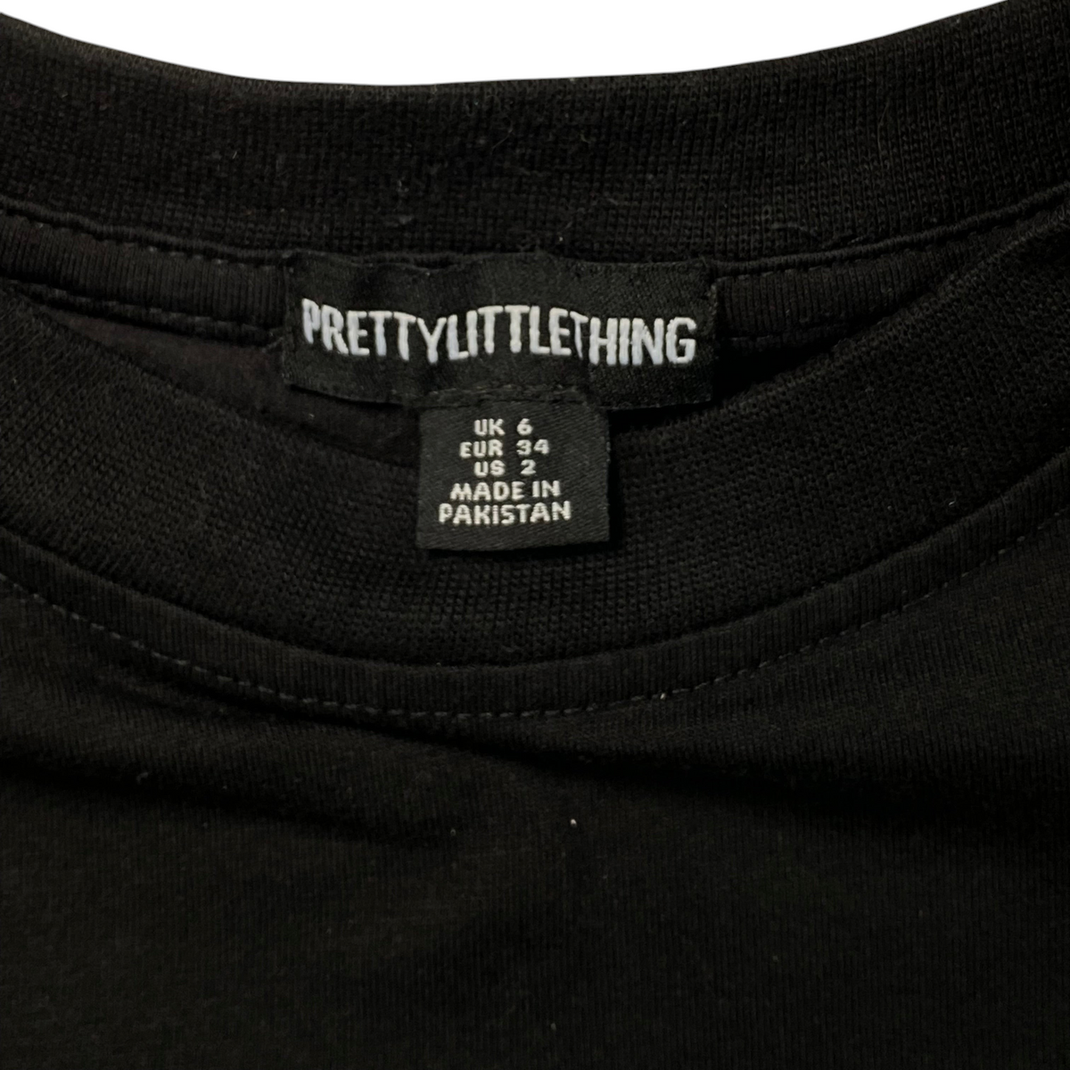 Digg It Thrift & Vintage black PrettyLittleThing crop t-shirt with size 34 label detail
