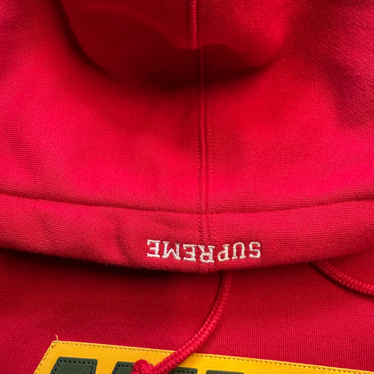 Digg It Thrift & Vintage red Nike x Supreme leather hoodie with embroidered logo detail on the hood