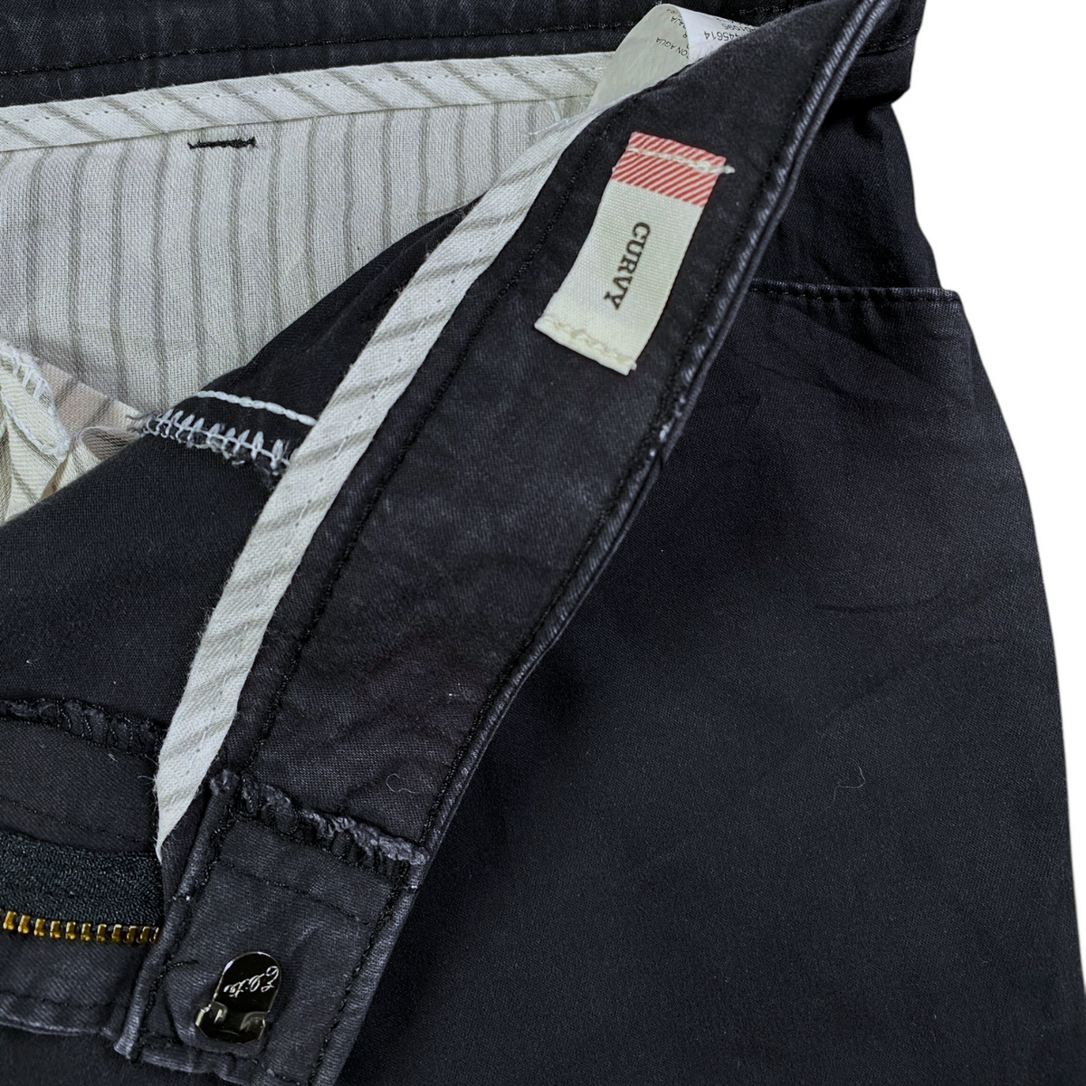 Digg It Thrift & Vintage dark grey Dickies women's pants featuring a curvy fit label and striped interior lining.