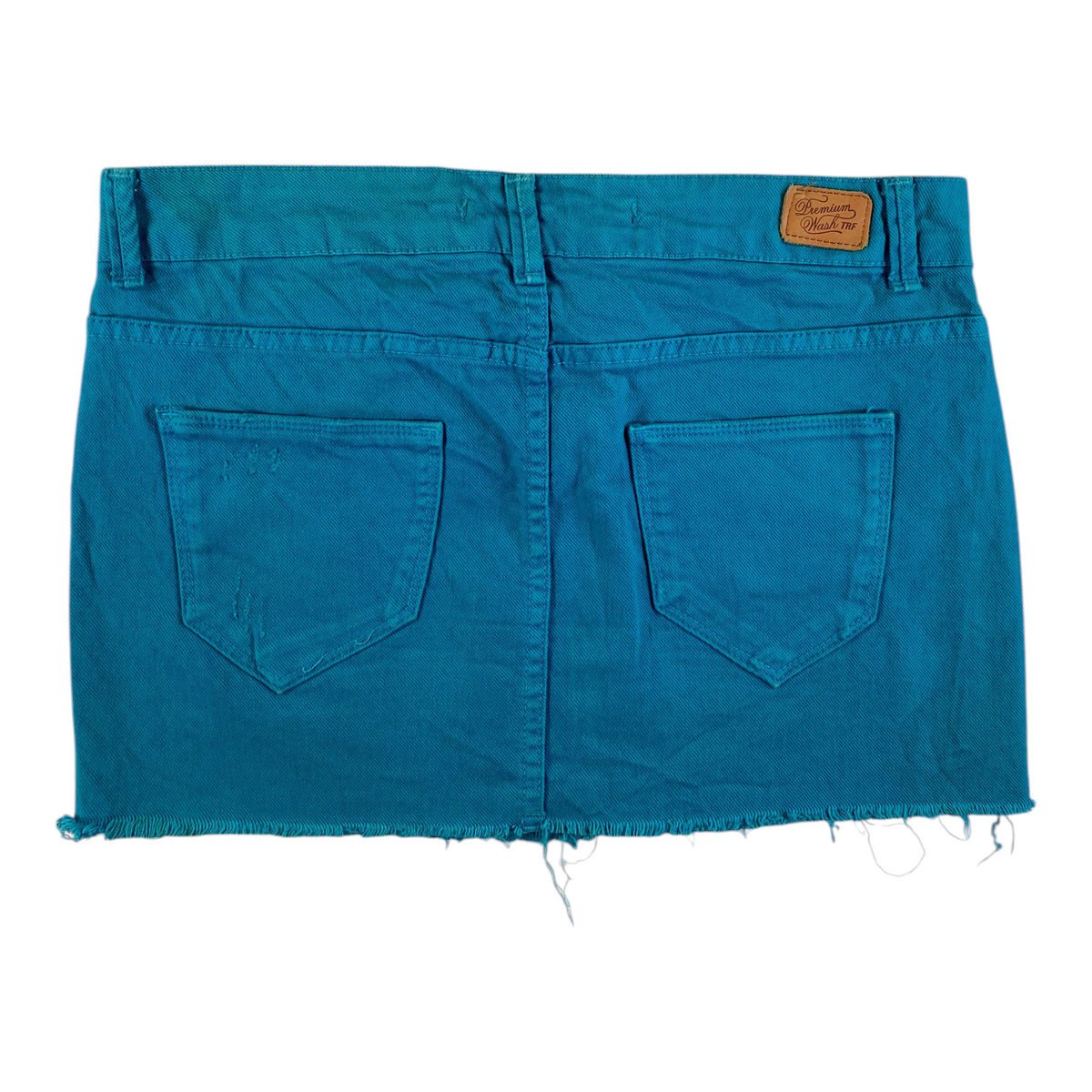 Digg It Thrift & Vintage teal denim mini skirt with a raw frayed hem and distressed detailing