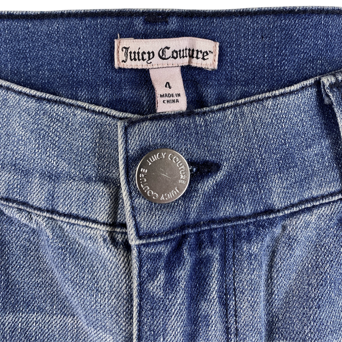 Digg It Thrift & Vintage Juicy Couture blue denim shorts with branded silver button and size 4 tag
