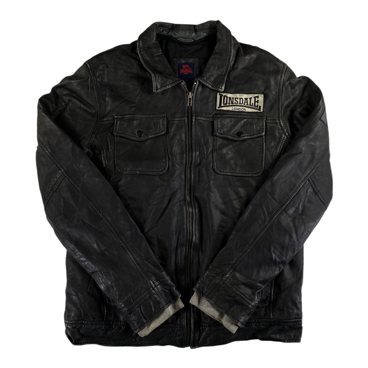 Digg It Thrift & Vintage black distressed leather Lonsdale London moto jacket with chest pockets and graphic patch