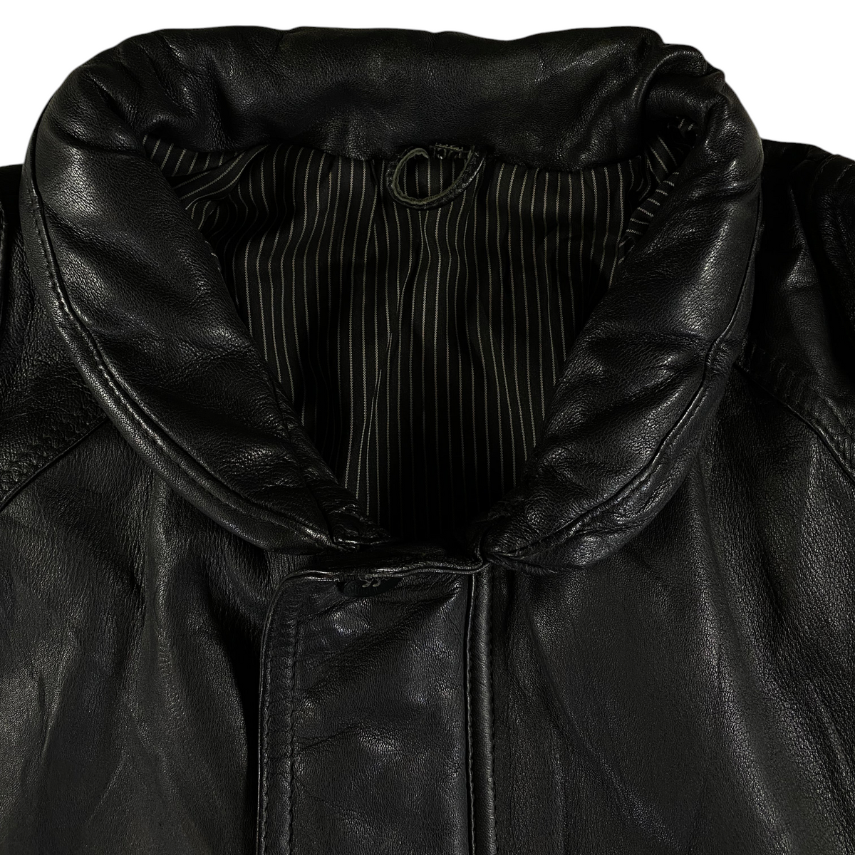 Digg It Thrift & Vintage black leather field parka jacket with a striped interior lining and wide collar