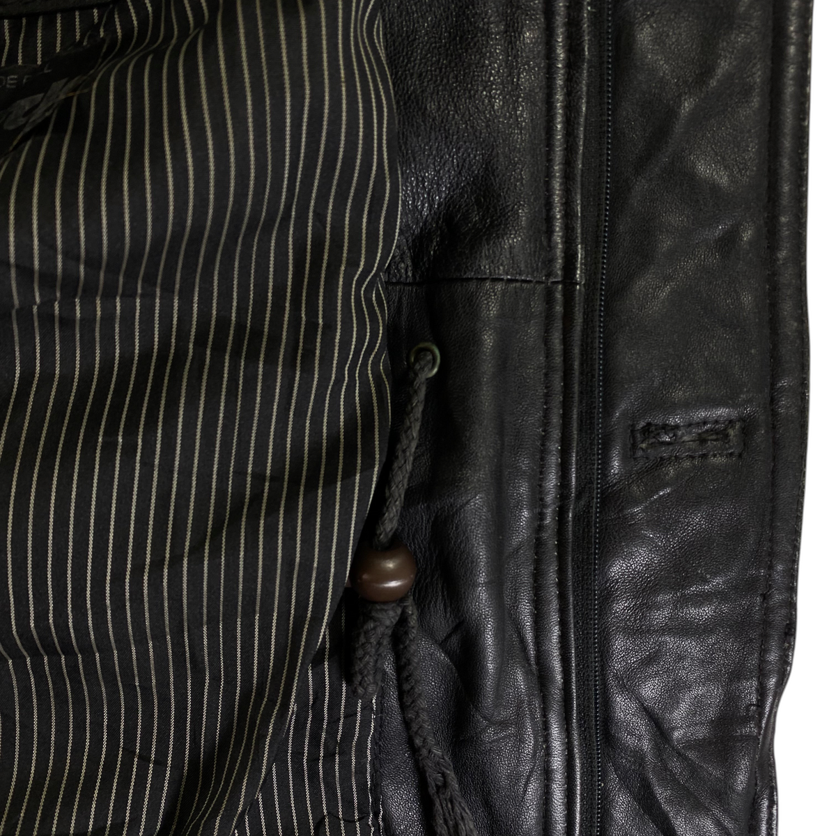 Digg It Thrift & Vintage Articles De Pell black leather field parka jacket with striped lining and drawstring detail