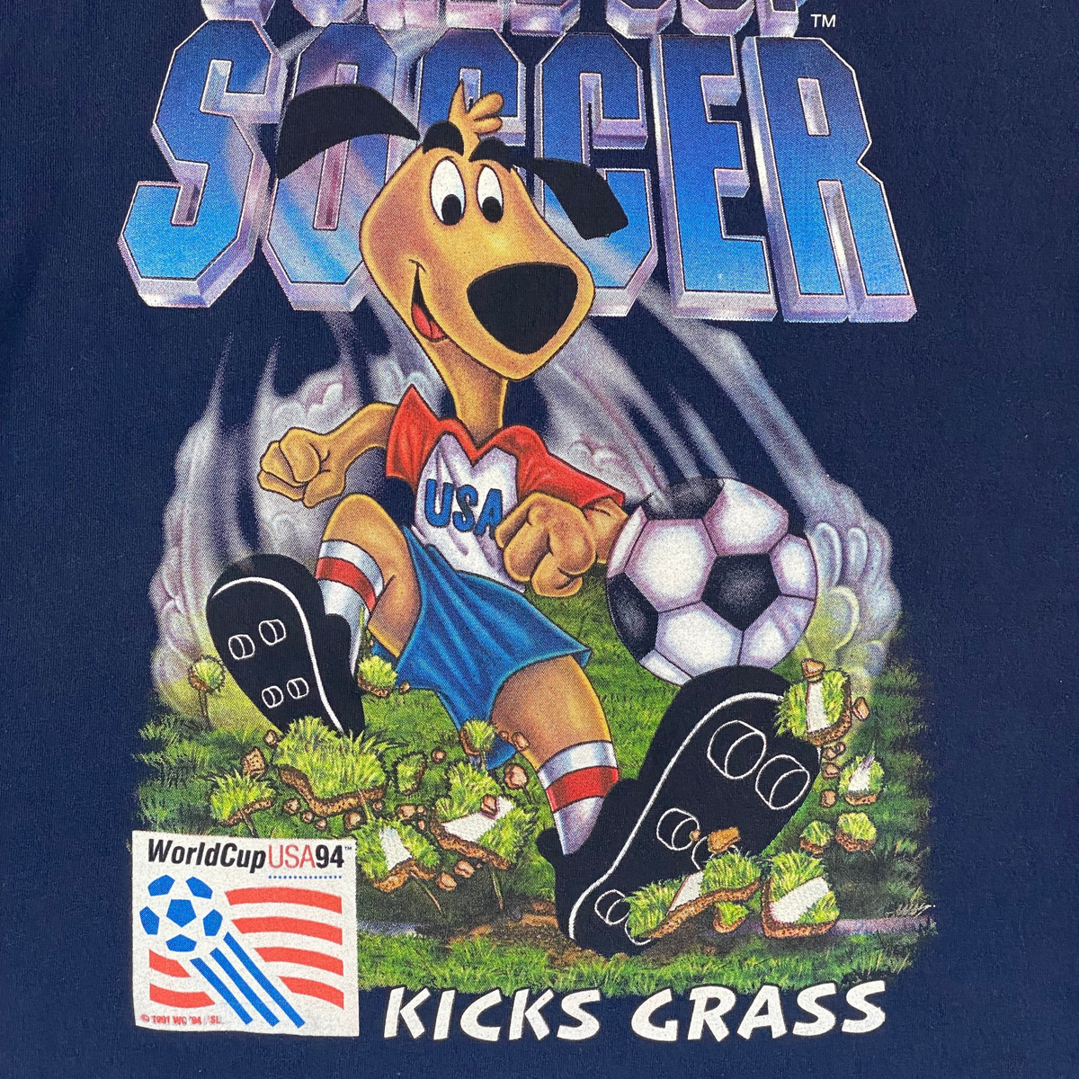 Vintage 1994 World Cup USA "Striker Kicks Grass" Mascot Graphic T-Shirt