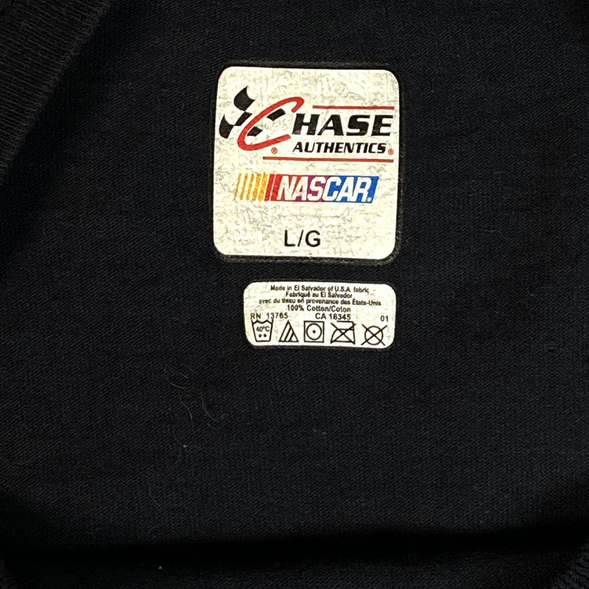 Digg It Thrift & Vintage Chase Authentics NASCAR t-shirt label showing size large and 100 percent cotton material