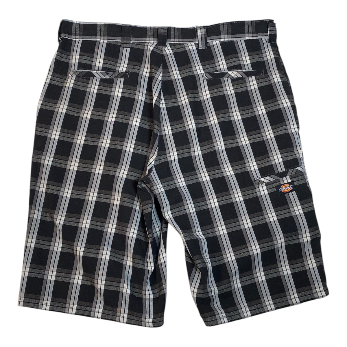 Digg It Thrift & Vintage Dickies black and white plaid shorts with back pockets and logo patch