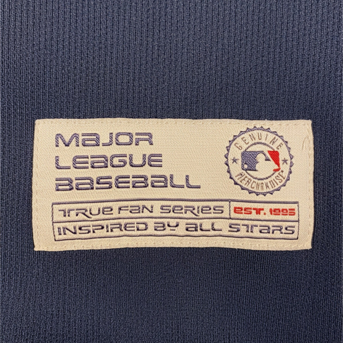 Digg It Thrift & Vintage True Fan MLB Milwaukee Brewers baseball jersey patch on navy blue fabric