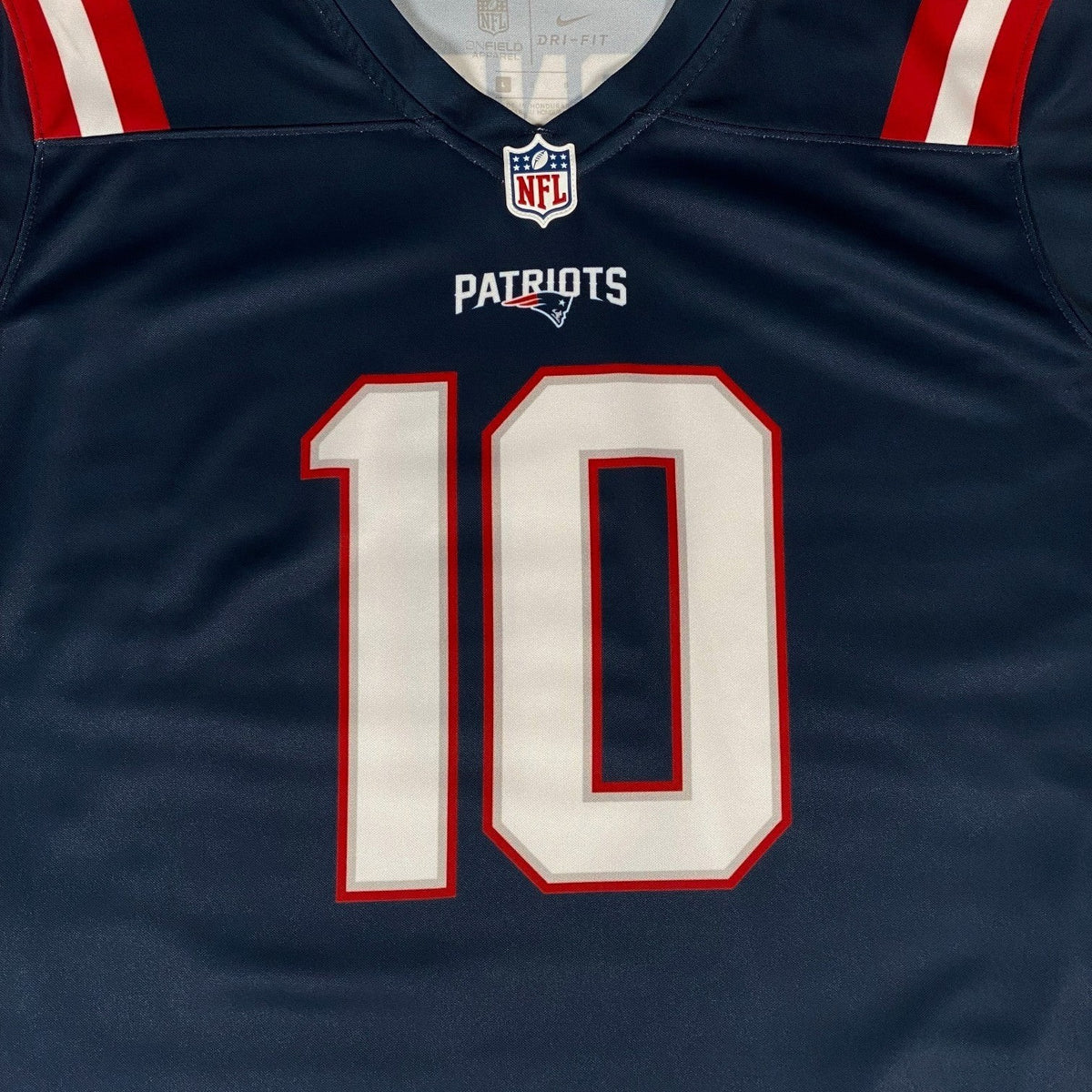 Digg It Thrift & Vintage New England Patriots Mac Jones jersey in navy blue with red and white details