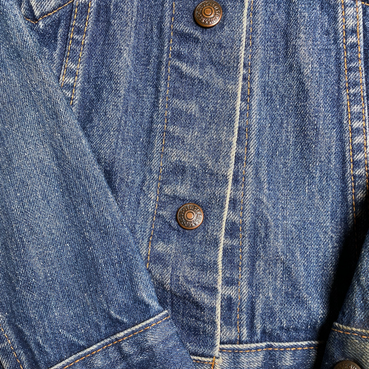 Digg It Thrift & Vintage 1970s Levi's for Gals blue denim trucker jacket with copper buttons and contrast stitching.