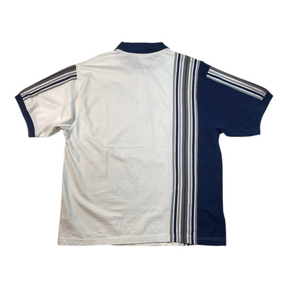 A short-sleeve athletic jersey shown from the back, featuring a white body, navy blue collar and sleeve, and vertical stripes running down the center and across the sleeves.