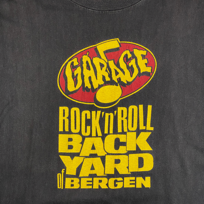 Digg It Thrift & Vintage faded black graphic t-shirt featuring Garage Rock'N'Roll Backyard Bergen yellow red print