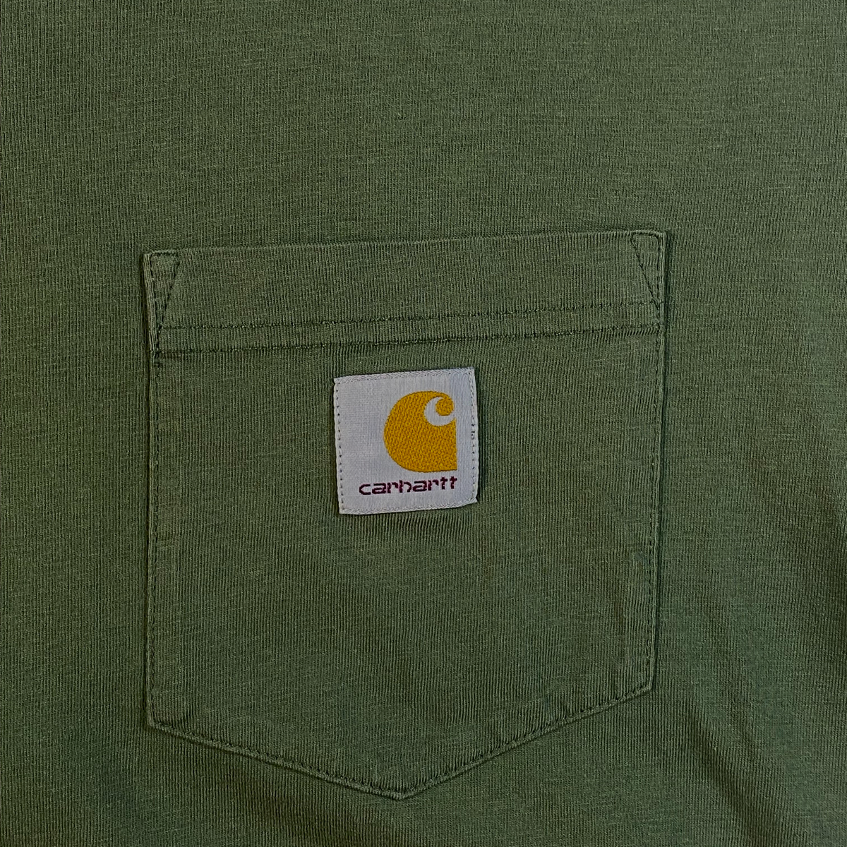 Digg It Thrift & Vintage olive green Carhartt WIP heavyweight cotton t-shirt with a chest pocket and logo patch