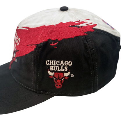 Digg It Thrift & Vintage 90s Chicago Bulls wool snapback cap with black, red, and white splash graphic design
