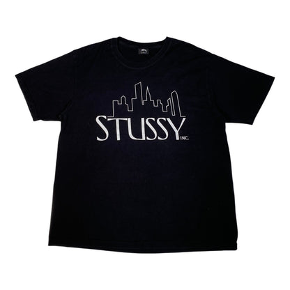A plain black short-sleeve crewneck t-shirt shown from the back, laid flat against a solid white background.
