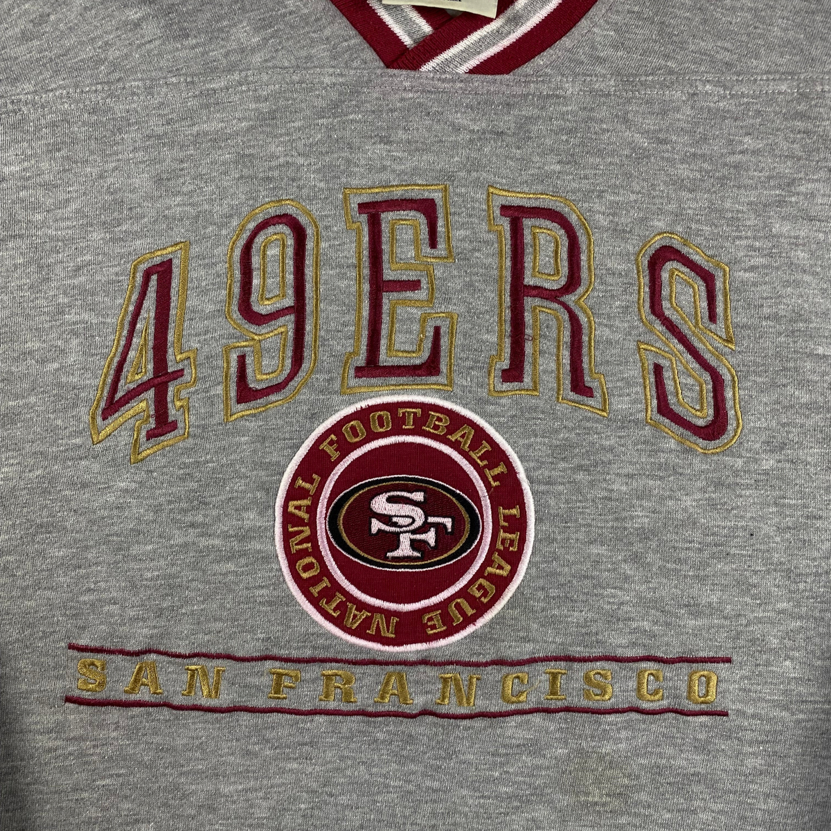 Digg It Thrift & Vintage grey San Francisco 49ers NFL v-neck sweatshirt with embroidered team logo and lettering