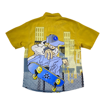 Digg It Thrift & Vintage yellow short sleeve shirt featuring a skater anime graphic print on the back