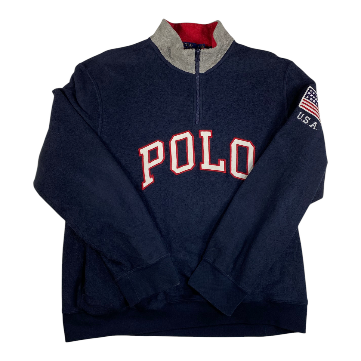 Digg It Thrift & Vintage navy fleece quarter-zip sweatshirt with red Polo logo and USA flag patch on the sleeve.