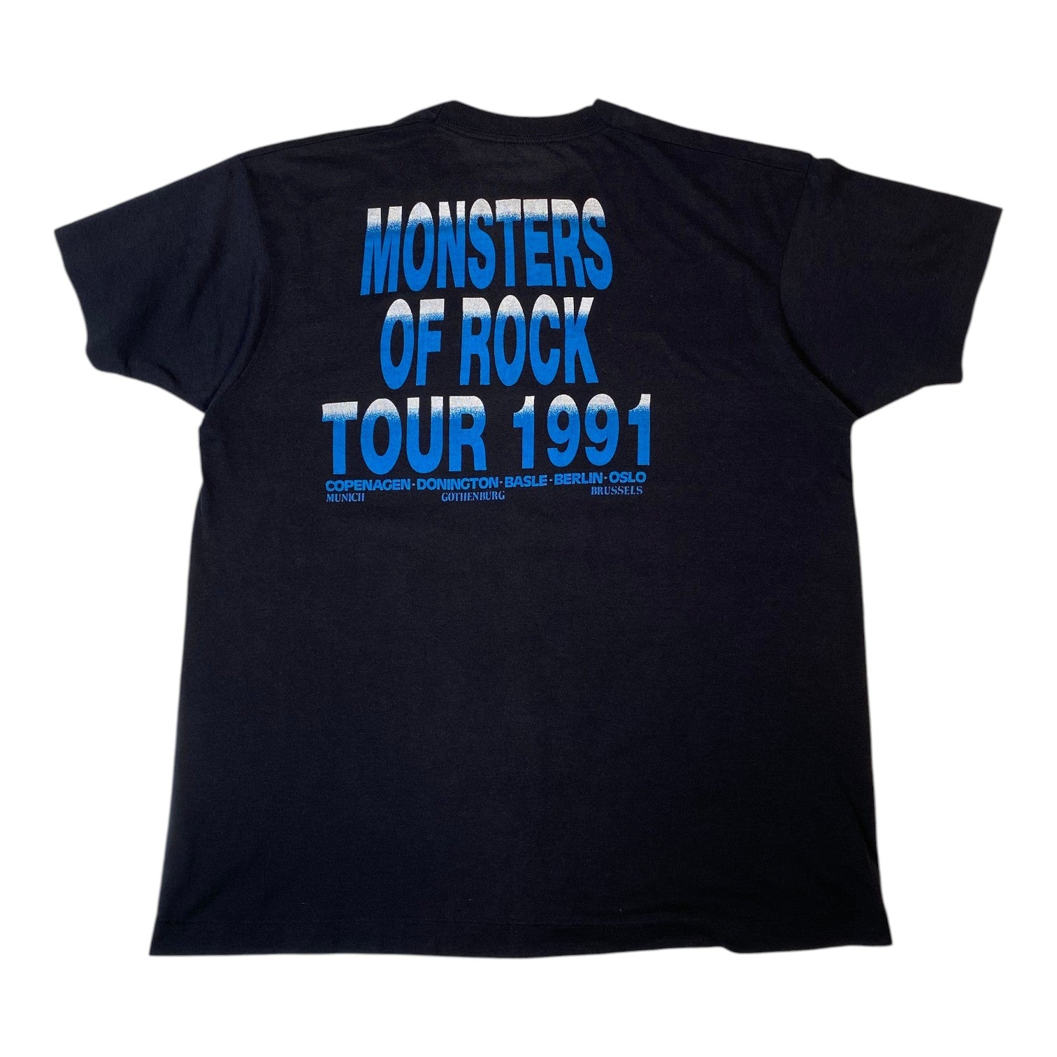 A black short-sleeve t-shirt showing the back side with a large blue graphic print that reads 'MONSTERS OF ROCK TOUR 1991' in stacked text.
