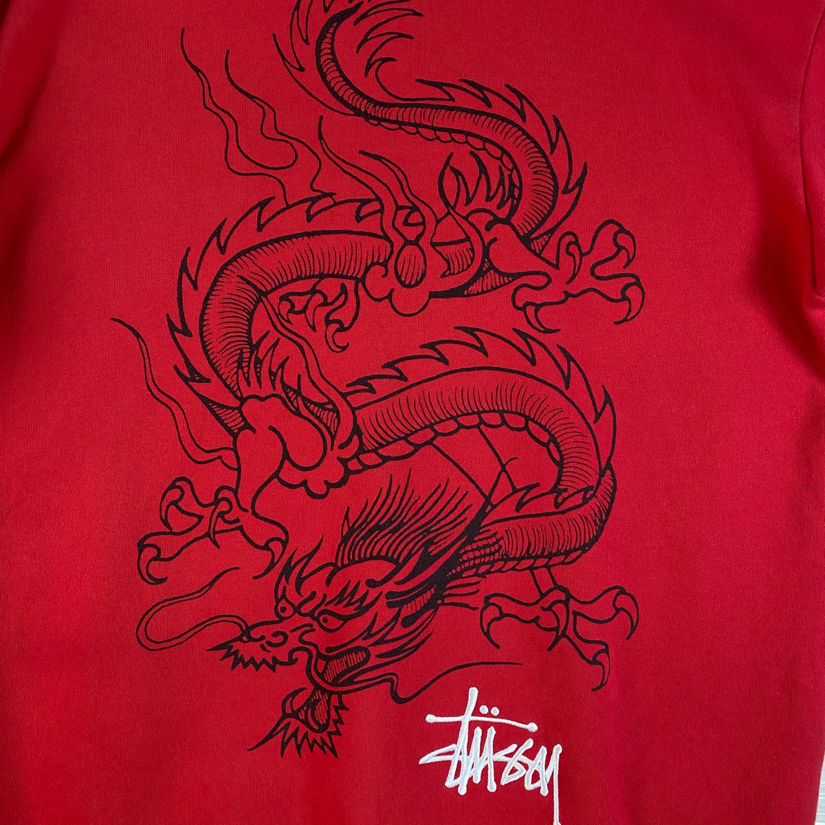 Digg It Thrift & Vintage red Stüssy pullover hoodie featuring a detailed black dragon graphic and white logo print