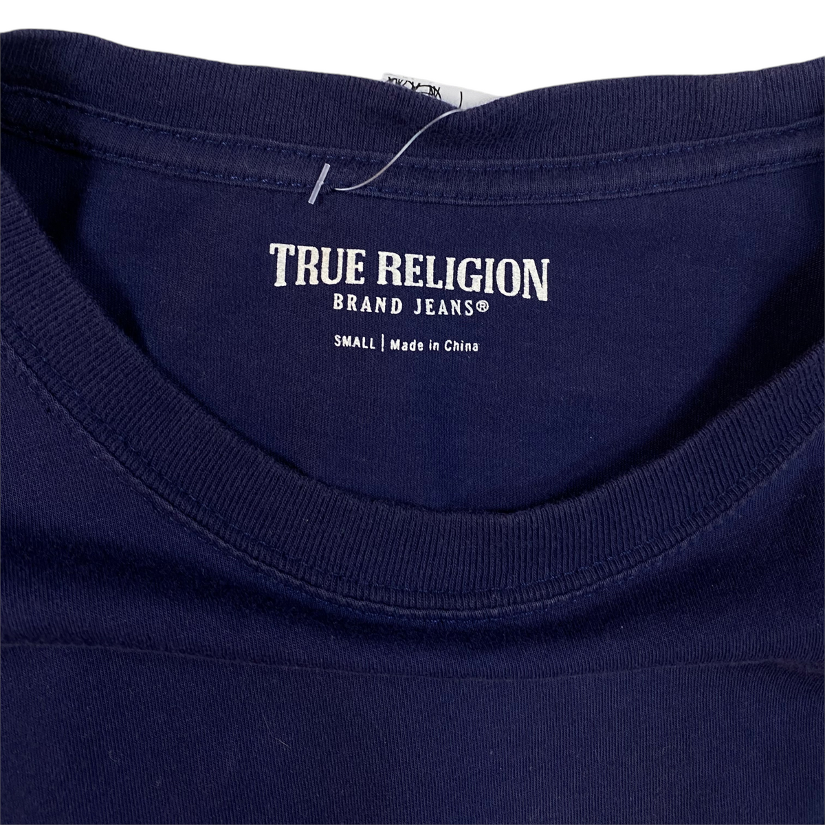 Digg It Thrift & Vintage navy blue True Religion t-shirt with interior brand label showing size small