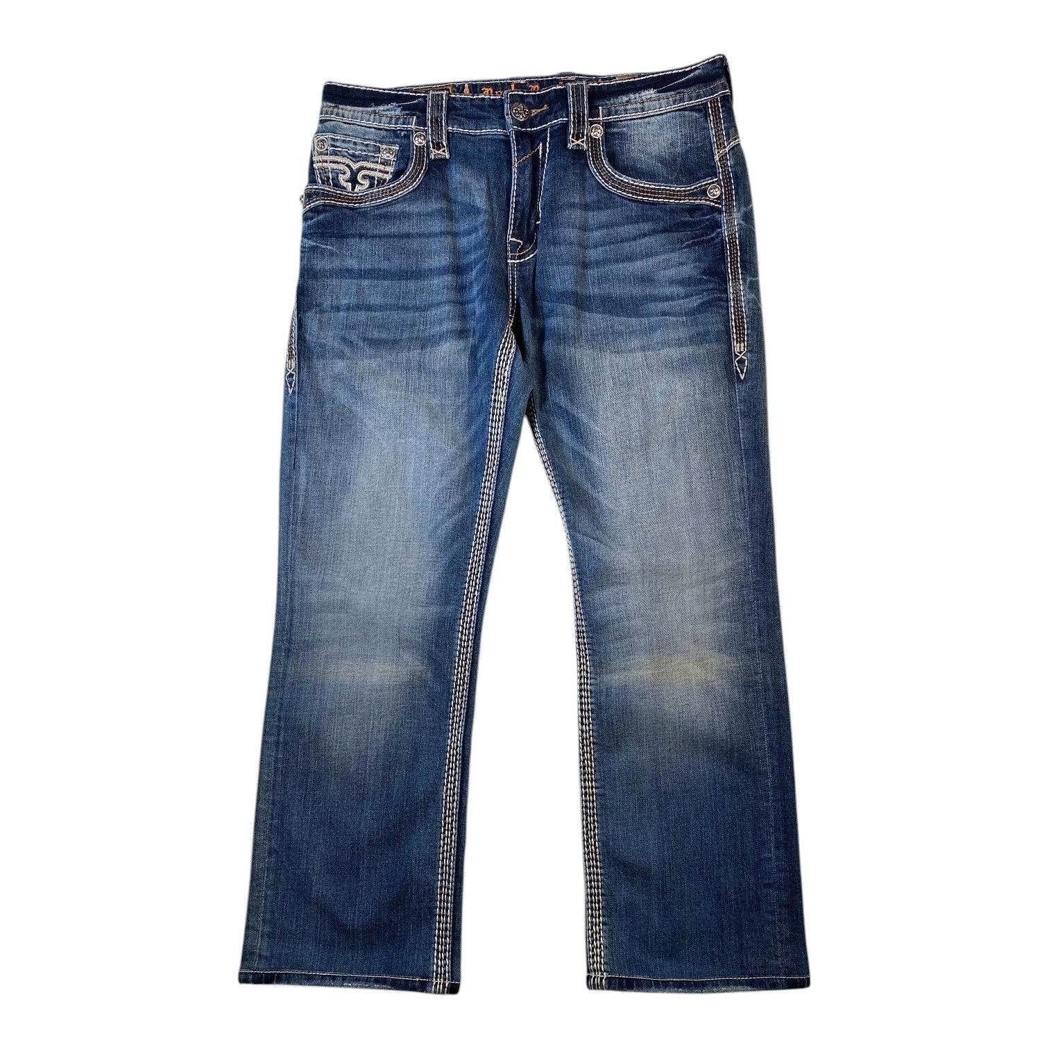 A pair of blue denim jeans with a faded wash and distinctive contrast stitching, shown flat against a white background.