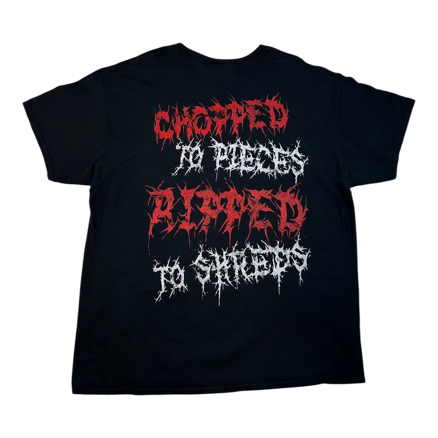 A black short-sleeve t-shirt with a graphic print on the front reading 'CHOPPED IN PIECES RIPPED TO SHREES' in red and white stylized text, shown against a plain white background.