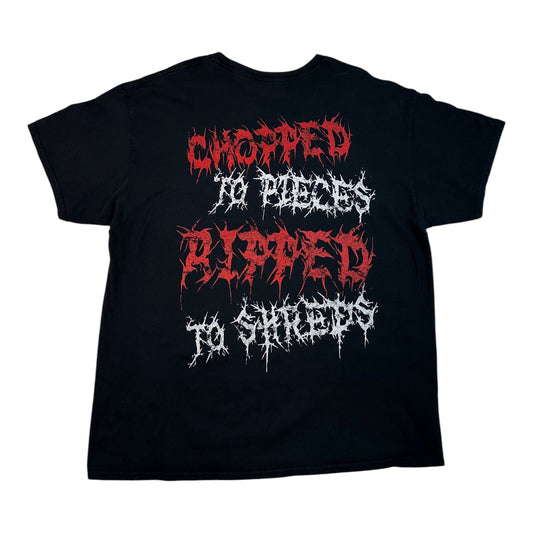 A black short-sleeve t-shirt with a graphic print on the front reading 'CHOPPED IN PIECES RIPPED TO SHREES' in red and white stylized text, shown against a plain white background.