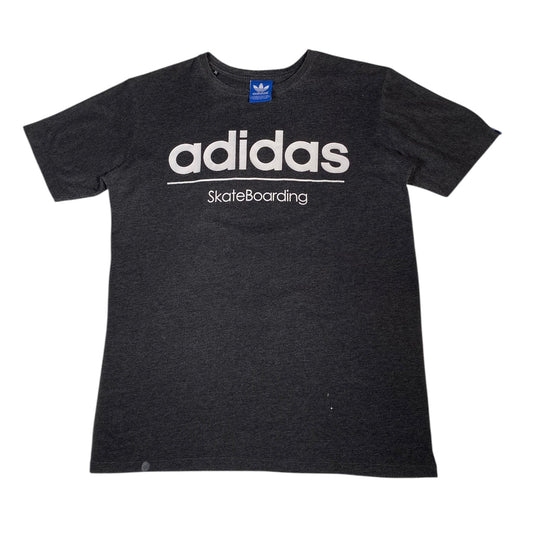 A dark heather gray Adidas Skateboarding t-shirt with a white printed logo on the front, displayed flat against a white background.
