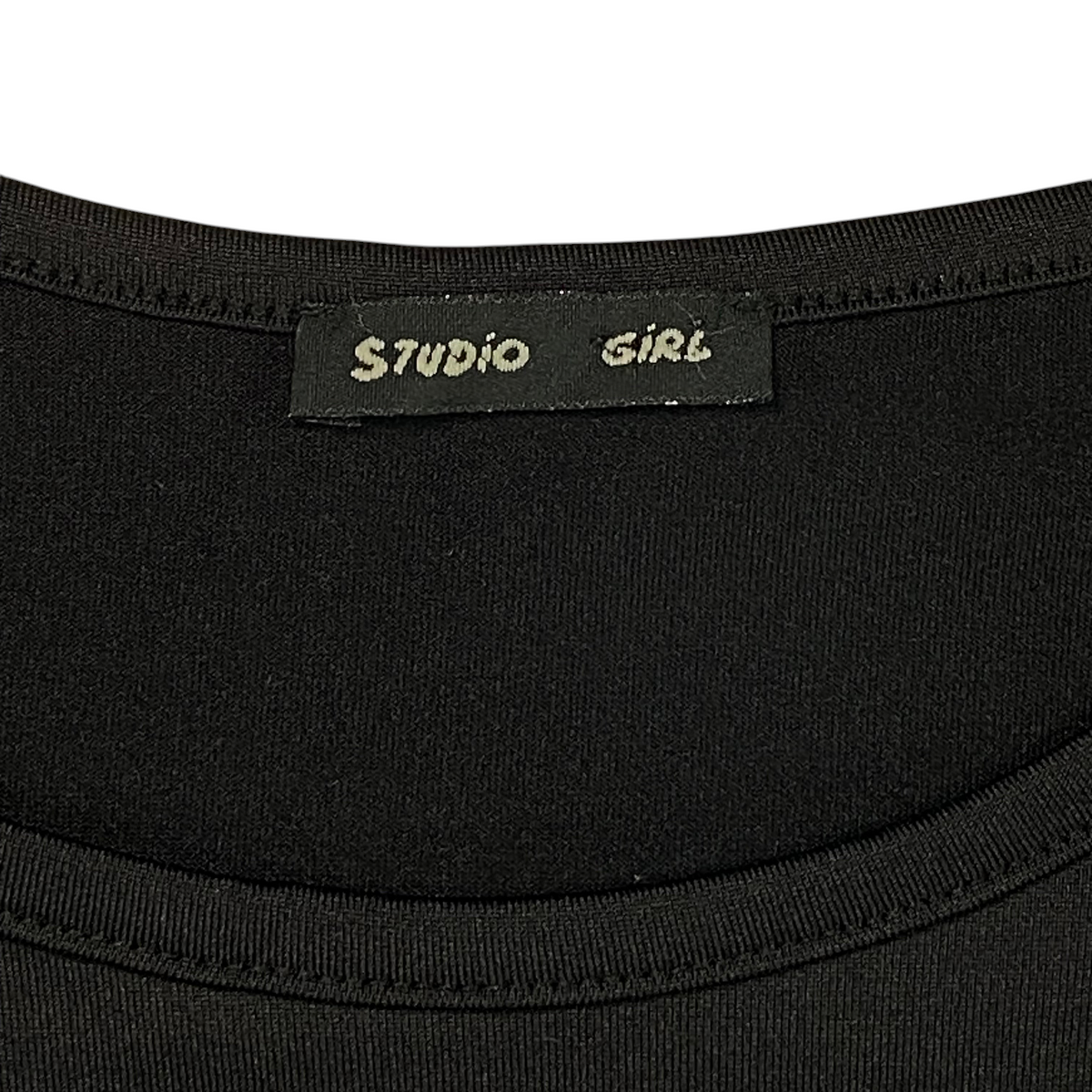 Digg It Thrift & Vintage Studio Girl black raglan top brand label detail