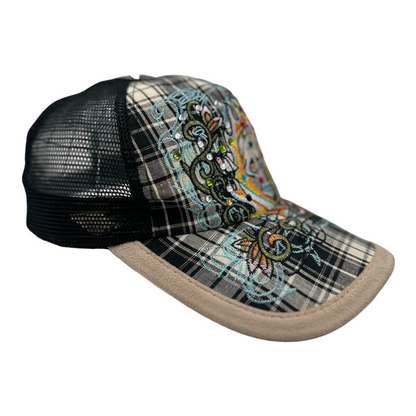 Digg It Thrift & Vintage Y2K Ed Hardy trucker cap with rhinestone skull, plaid brim, and black mesh back panels.