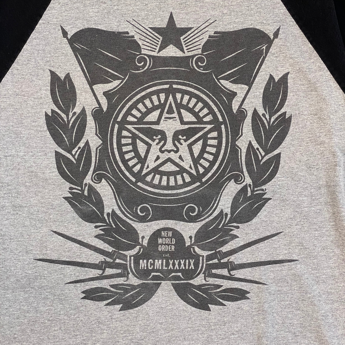 Digg It Thrift & Vintage Obey Propaganda two-tone raglan graphic t-shirt in grey with black sleeves and star logo