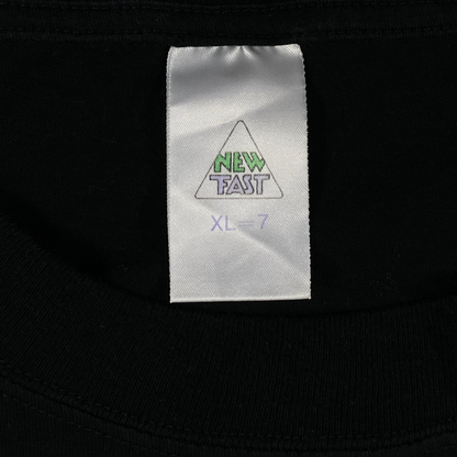 Digg It Thrift & Vintage black t-shirt interior neck label with New Fast branding and size XL tag