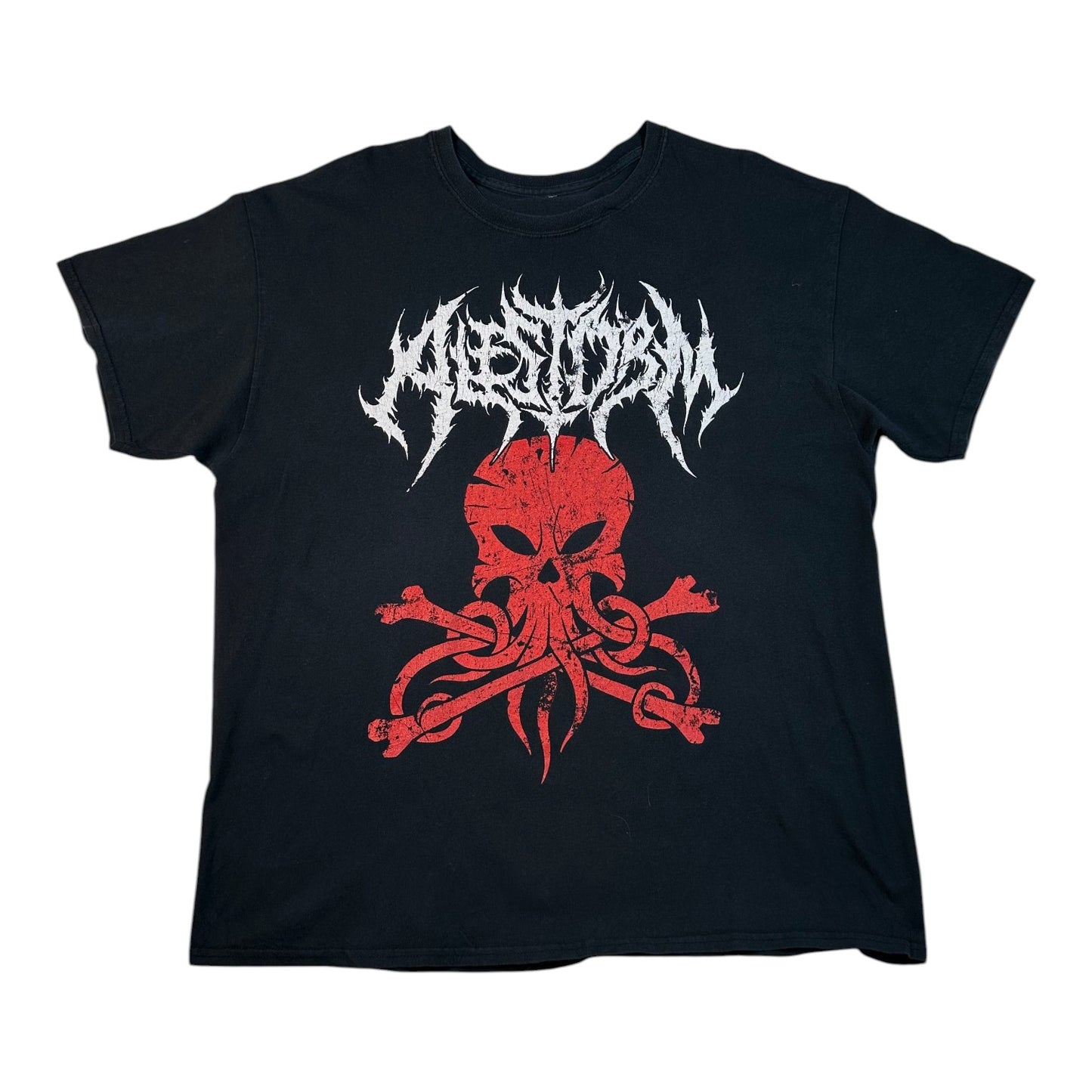 A black short-sleeve t-shirt featuring a distressed red skull and crossbones graphic with tentacles, and the white metal-style band name 'Mestorm' printed above it.