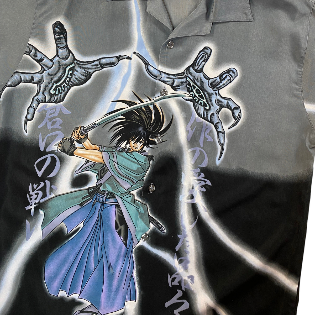 Digg It Thrift & Vintage All Things Collection gray and black short sleeve shirt featuring anime samurai graphic