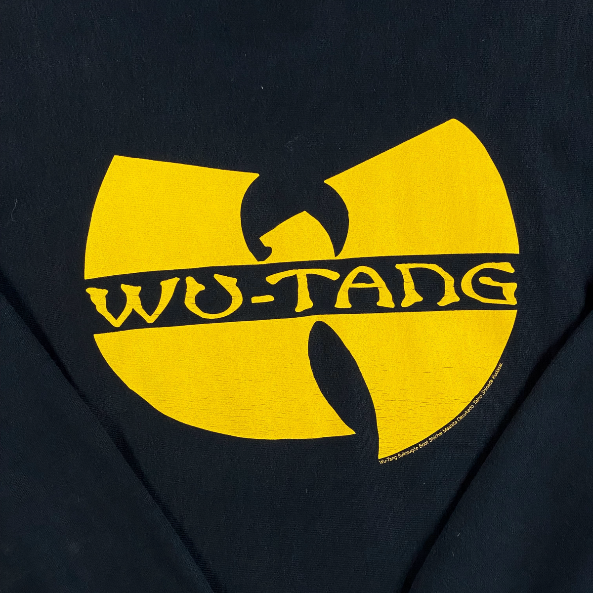 Digg It Thrift & Vintage black crewneck sweatshirt featuring the iconic yellow Wu-Tang Clan bat logo graphic