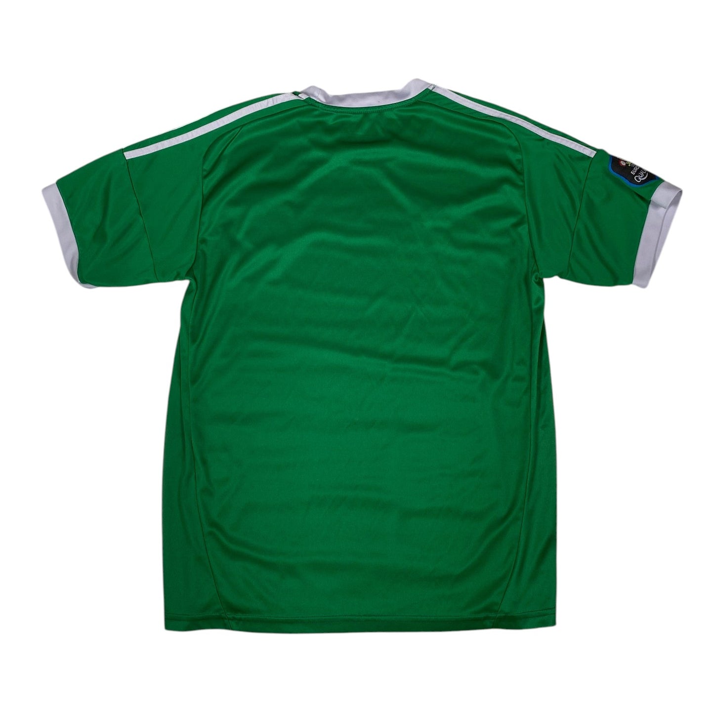 A green short-sleeve athletic jersey shown from the back, featuring white stripes along the shoulders and white trim at the collar and sleeve cuffs, on a plain white background.