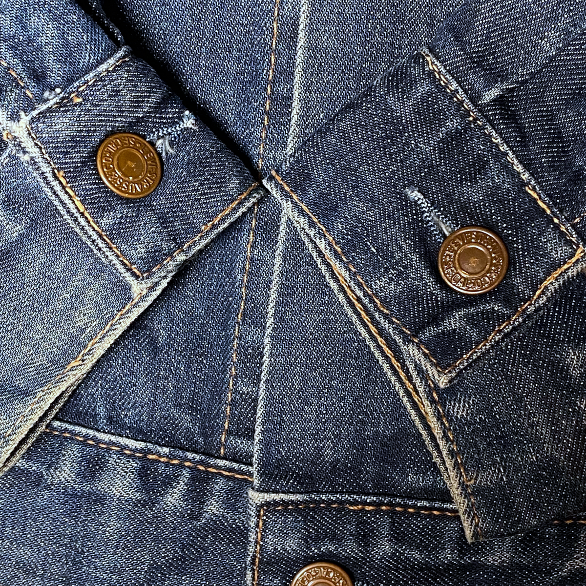 Digg It Thrift & Vintage Levi's denim trucker jacket detail showing copper buttons and contrast stitching