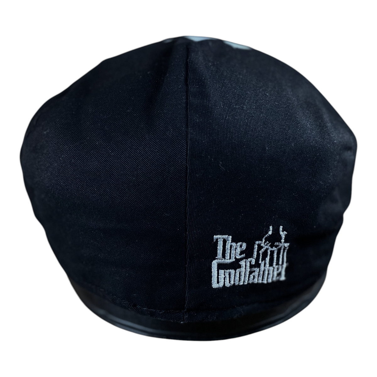 Digg It Thrift & Vintage black flat cap featuring The Godfather embroidered logo on the side