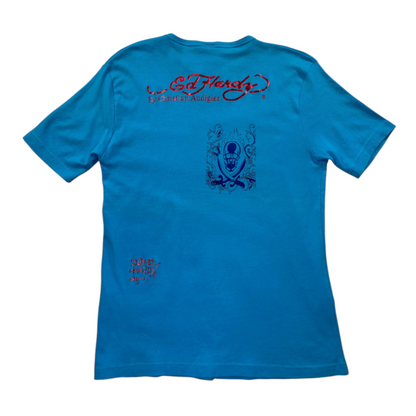 Digg It Thrift & Vintage turquoise Ed Hardy t-shirt featuring a red rhinestone logo and skull and swords graphic.