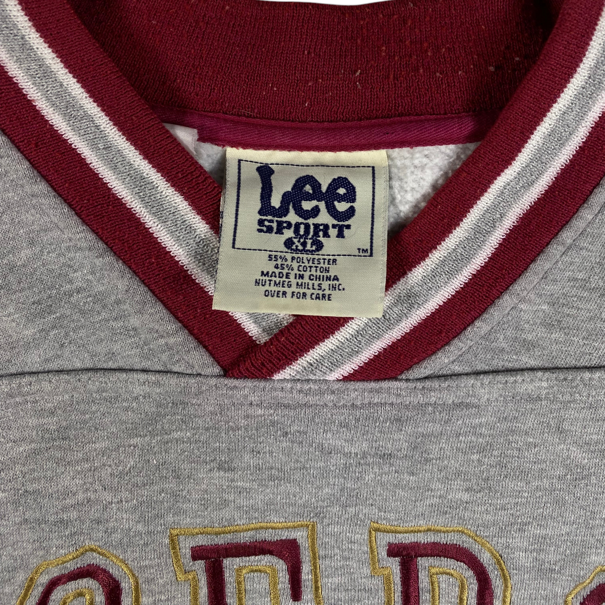 Digg It Thrift & Vintage Lee Sport NFL San Francisco 49ers sweatshirt tag showing XL size and material blend