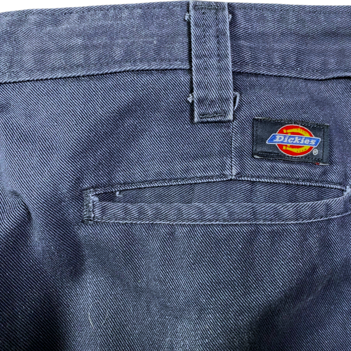 Digg It Thrift & Vintage Dickies navy work pants featuring a rear pocket and iconic brand logo patch