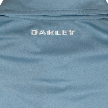 Digg It Thrift & Vintage light blue Oakley athletic golf polo shirt with embroidered logo detail