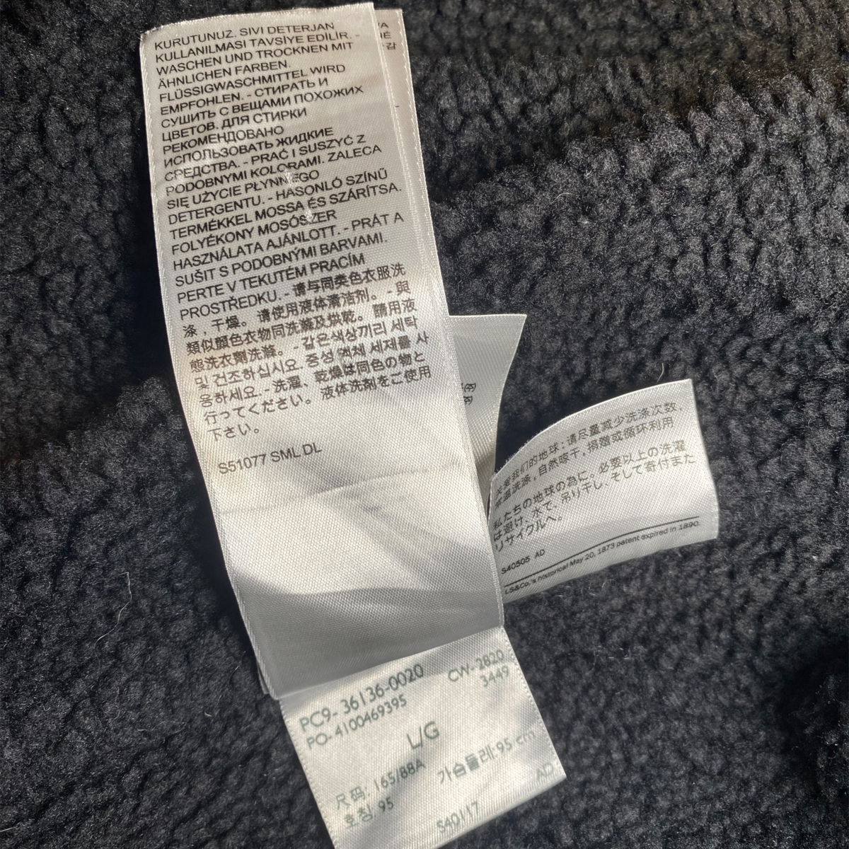 Digg It Thrift & Vintage Levi's denim jacket care label and size tag showing Large size and washing instructions