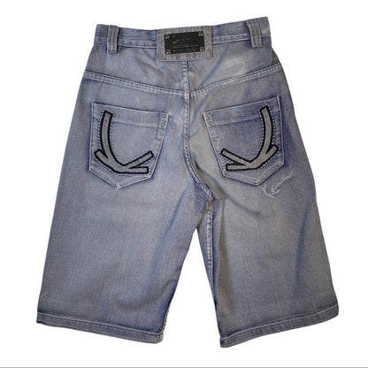 Light blue denim shorts viewed from the back, featuring decorative black embroidered arrow designs on the back pockets.