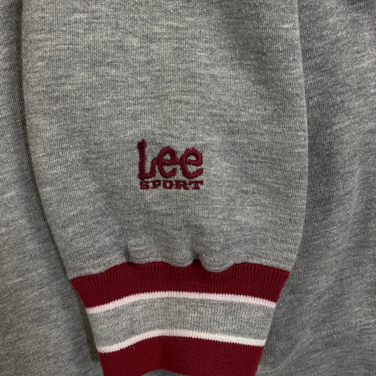 Digg It Thrift & Vintage grey Lee Sport sweatshirt sleeve with maroon and white striped ribbed cuff detail