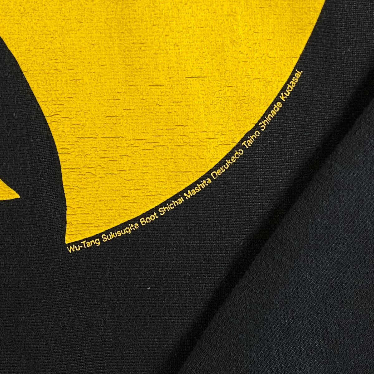 Digg It Thrift & Vintage black crewneck sweatshirt featuring a yellow Wu-Tang Clan logo with Japanese text detail.